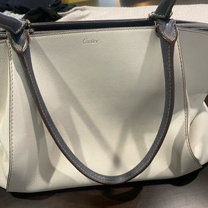 Beautiful Cartier Bag. Leather cream bag with Handel and trim in gray blue.